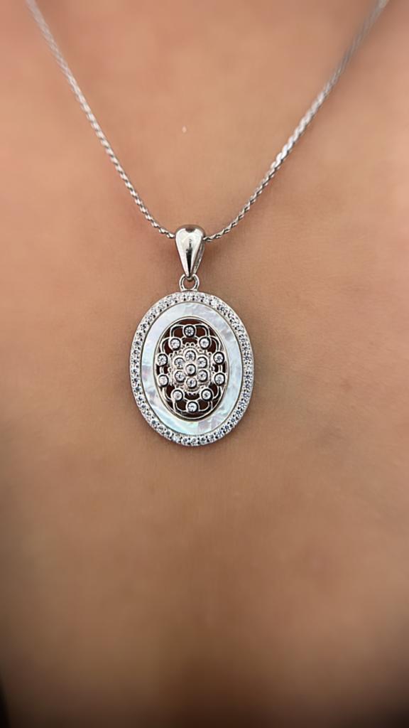 Radiant Elegance  : A Magnificent Oval Mother of Pearl Pendant Set.  Made in 925 Sterling Silver.